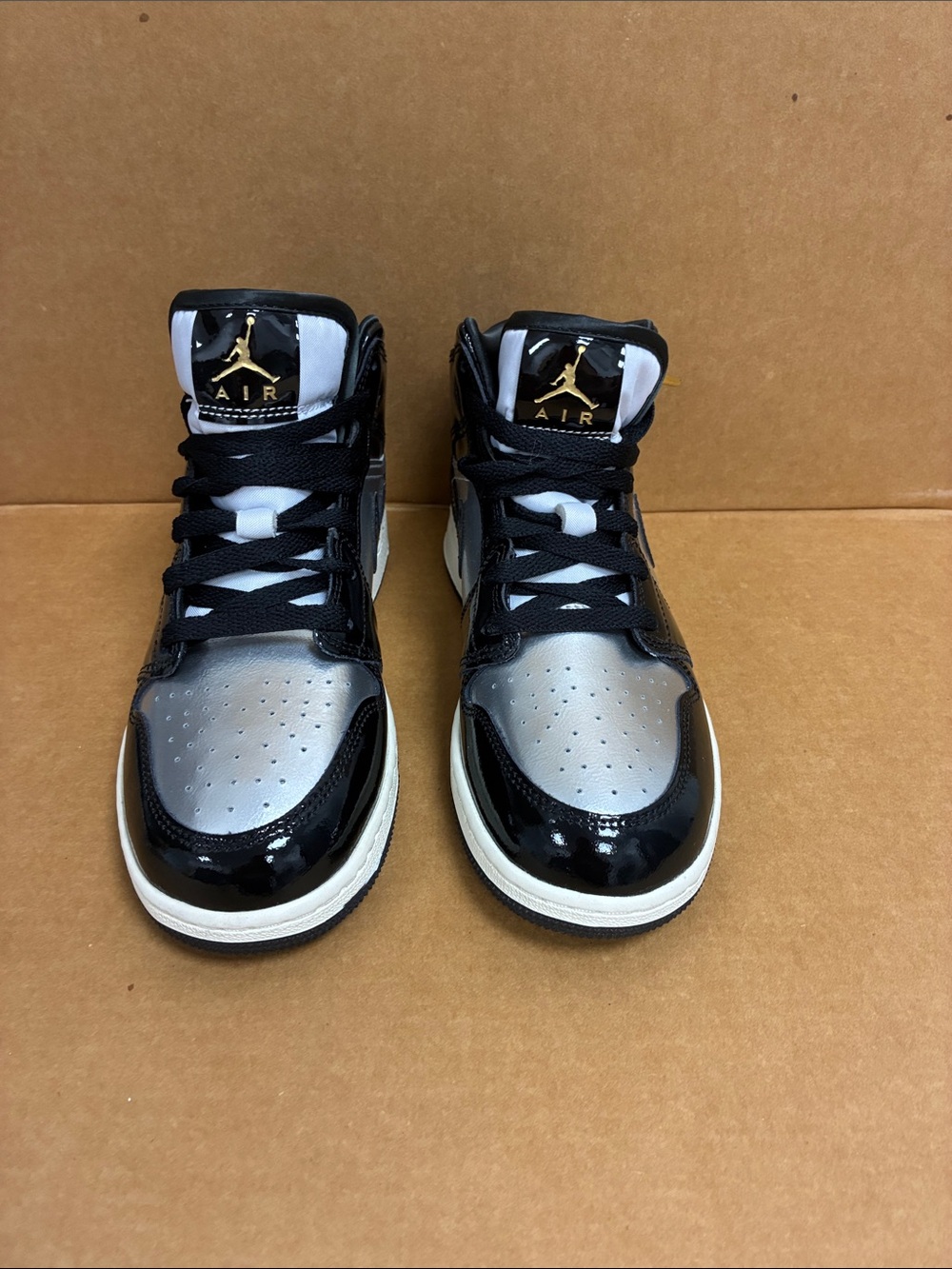 Nike Air Jordan 1 Mid Black/White/Metallic Gold Kid’s Sneakers